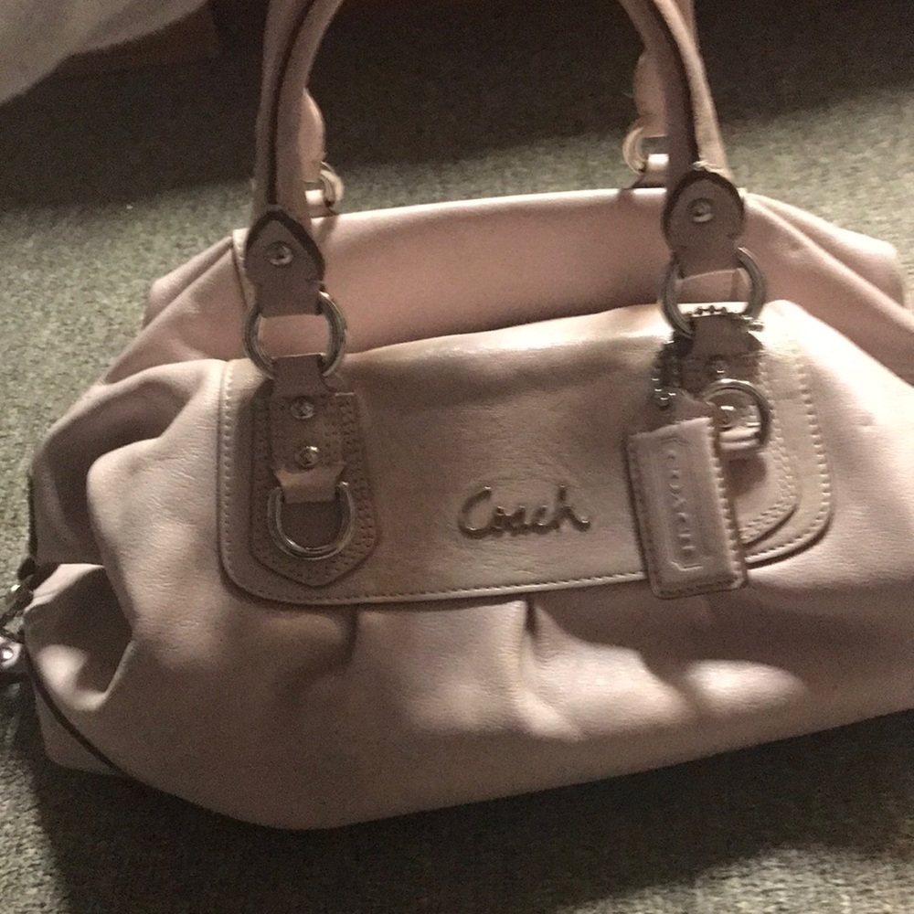 Light pink/purple coach purse